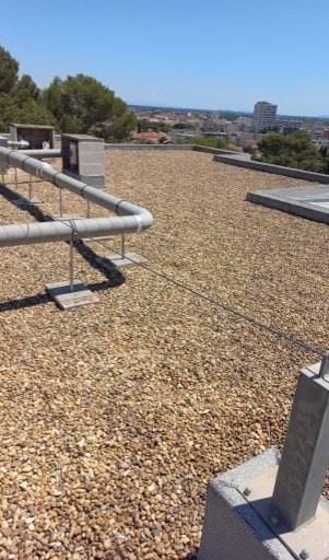 Réfection et entretien de la toiture des ouvrages d'étanchéité des toitures terrasses de la résidence OPPIDUM à Nîmes : étanchéité